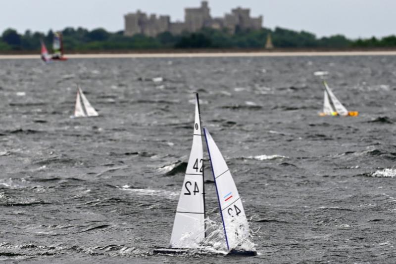The winner with Windsor Castle in the background - IOM Ranking round 3 and 4 at Datchet photo copyright David Adam taken at Datchet Water Radio Sailing Club and featuring the One Metre class