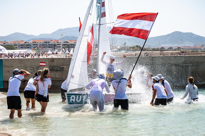 Austria wins gold in the Mixed 470 at Paris 2024 photo copyright World Sailing / Jean-Louis Carli taken at  and featuring the 470 class