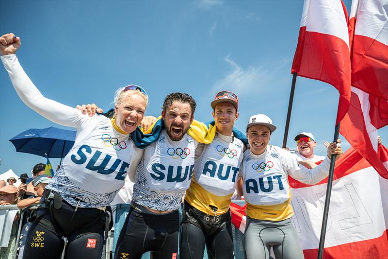 Sweden win bronze and Austria win gold in the Mixed 470 at Paris 2024 photo copyright World Sailing / Jean-Louis Carli taken at  and featuring the 470 class