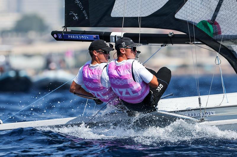 Isaac McHardie and Will McKenzie (NZL) - Silver Medalists - Mens Skiff - Paris2024 Olympic Sailing Event - Marseille - August 2, 2024 photo copyright World Sailing / Sander van der Borch taken at Royal Akarana Yacht Club and featuring the 49er class