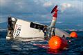 INEOS Britannia recover their capsized test boat T6, Palma - February 8, 2023 © Ugo Fonolla / America's Cup