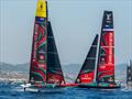 Emirates Team New Zealand AC 40, passes to windward of the AC75 in Barcelona © James Somerset / Emirates Team New Zealand