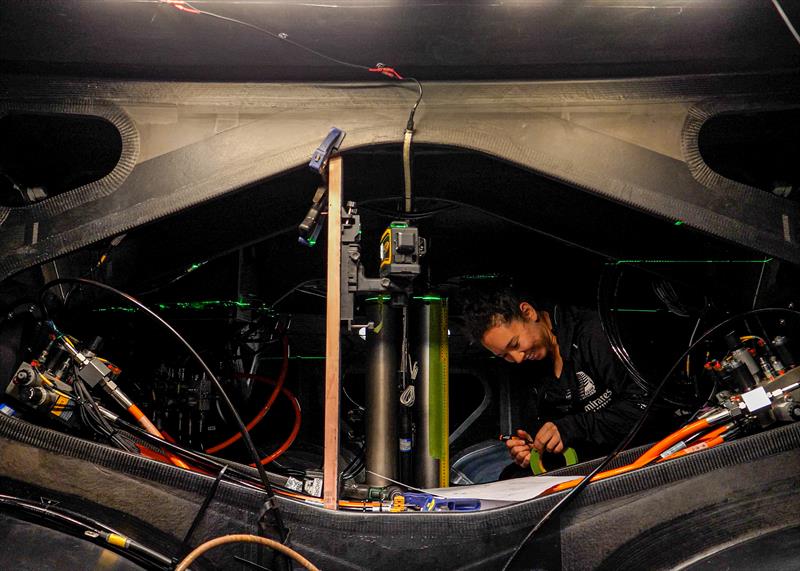 Kelly Hartzell of ETNZ's Mechatronincs Team works inside the AC40 hull prior to stress testing  - September 2022 photo copyright Emirates Team NZ taken at Royal New Zealand Yacht Squadron and featuring the AC40 class