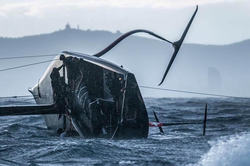 Boat Zero got knocked flat by the weather bomb - Alinghi Red Bull Racing - Barcelona- August 2022 photo copyright Alinghi Red. Bull Racing taken at Société Nautique de Genève and featuring the AC75 class