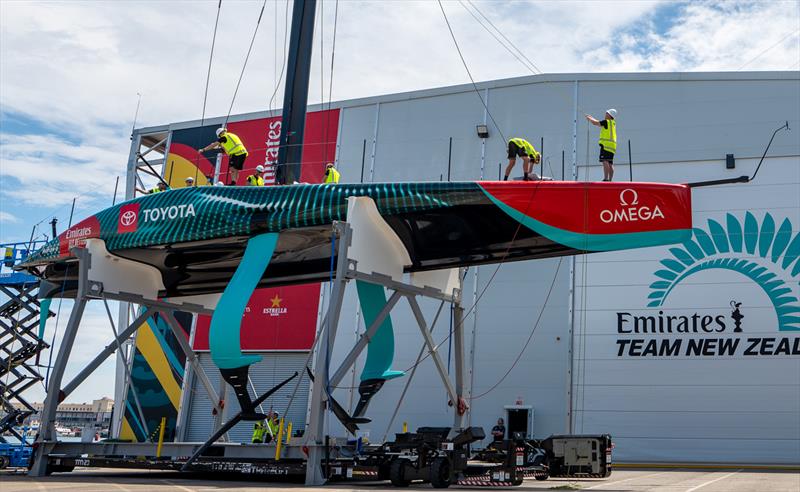 Emirates Team New Zealand AC75 raceboat has had the fairing pieces removed from the supplied one design foil arms, and the trailing edge of the foil arm is now completely straight - photo © Hamish Hooper