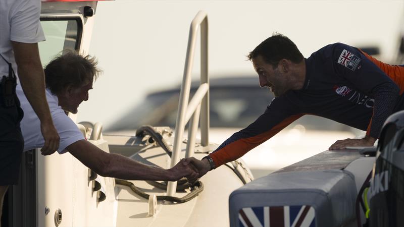 Sir Jim Ratcliffe and Sir Ben Ainslie shake hands after INEOS Britannia wins the Louis Vuitton Cup Round Robin Series - 9th September 2024 photo copyright David Maynard / www.alleycatphotographer.com taken at  and featuring the AC75 class