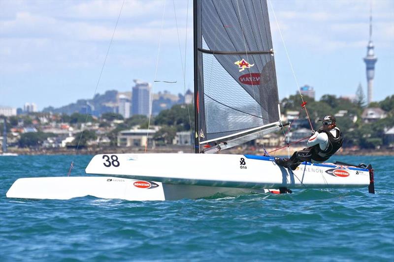 Glenn Ashby on his way to winning the 2014 World titles in the A-class Catamaran off Takapuna - photo © Richard Gladwell