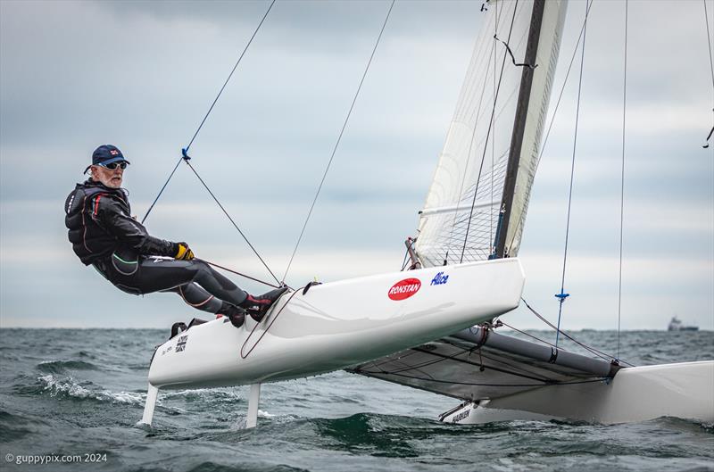 Pete Boxer riding his Aussie built Tool on the final day of the Unicorn and A Class Catamaran Nationals at Hayling Ferry SC photo copyright Gordon Upton / www.guppypix.com taken at Hayling Ferry Sailing Club and featuring the A Class Catamaran class