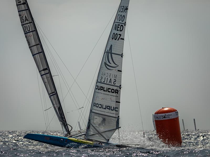 A Class Cat Regata Nazionale - Ravi Parent USA 76 and Mischa Heemskerk NED 007 tussle at the downwind mark on race one - photo © Gordon Upton / www.guppypix.com