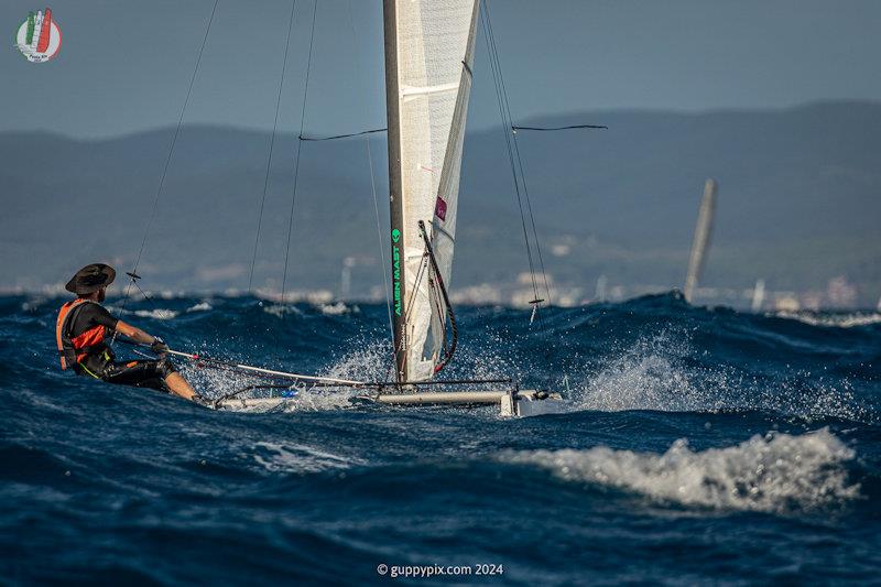 German A-Cat newbie, Jan Hagen Voight, GER 342, having the time of his life  - A Class Cat Worlds at Punta Ala day 1 photo copyright Gordon Upton / www.guppypix.com taken at Centro Velico Punta Ala and featuring the A Class Catamaran class