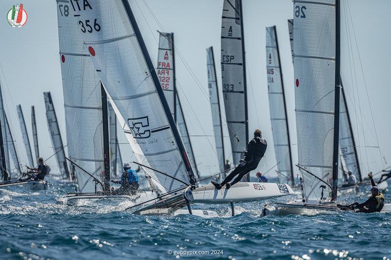 The Classic fleet round the top spreader on the first lap, race 3  - A Class Cat Worlds at Punta Ala day 2 - photo © Gordon Upton / www.guppypix.com