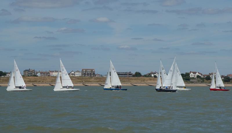 Ajax Nationals at Harwich: The fleet beating away from the leeward mark with Dovercourt in the backround photo copyright Hazel Mayhew taken at Royal Harwich Yacht Club and featuring the Ajax class