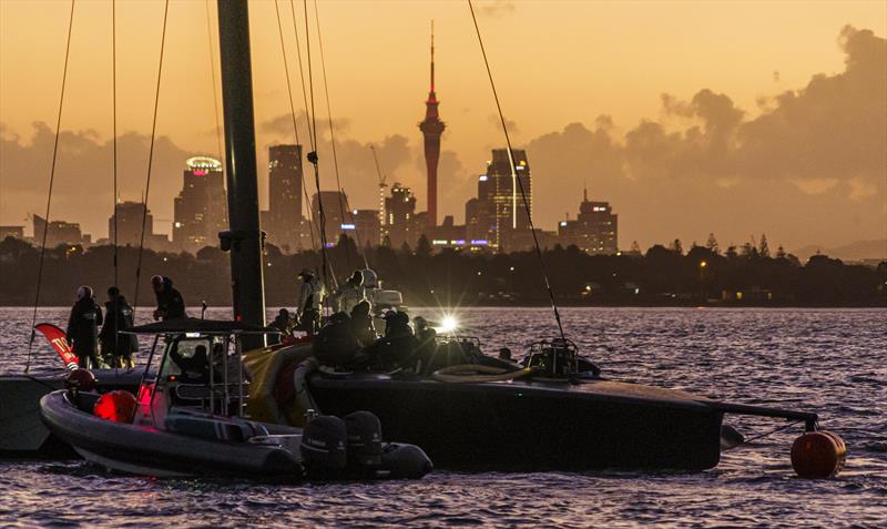 American Magic's Patriot under tow at sunset on the Waitemata harbour - January 17, 2021, Prada Cup - photo © COR 36 | Studio Borlenghi