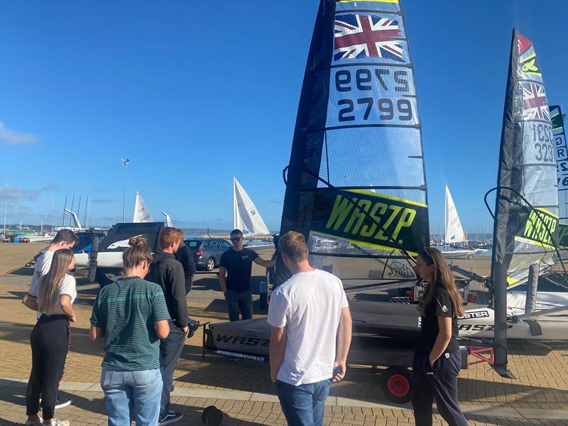 Group briefing with Sam Whaley, WASZP Coach photo copyright ASC Performance Academy taken at Andrew Simpson Sailing Centre and featuring the  class