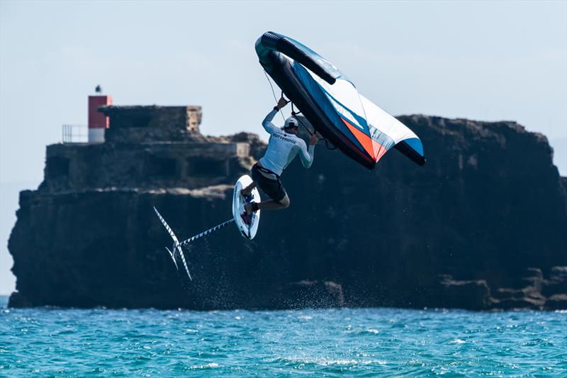 Nathan Outteridge jumping high during a wing foiling session in Tarifa, Spain photo copyright Beau Outteridge taken at Real Club Náutico de Palma and featuring the  class