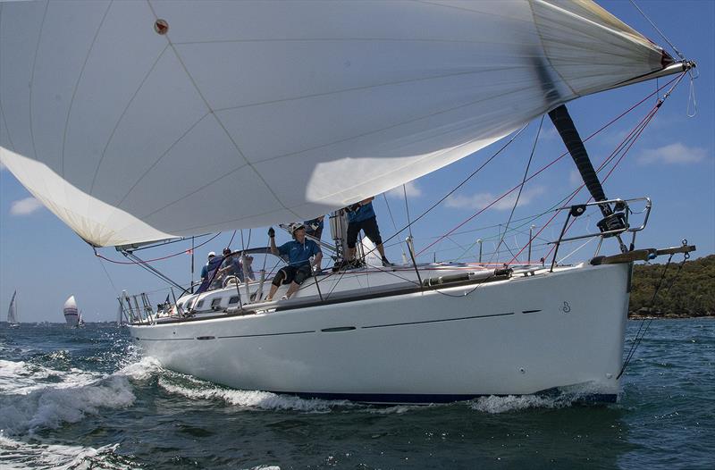 Ian Creak and the crew of Ausreo powering back down the harbour under a very shy symmetrical spinnaker photo copyright John Curnow taken at Cruising Yacht Club of Australia and featuring the Beneteau class