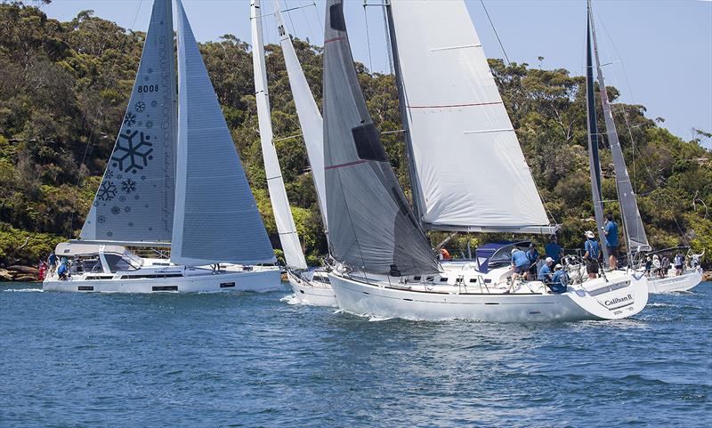 The Spinnaker Division jostle for position immediately after the start to get out of Taylors Bay photo copyright John Curnow taken at Cruising Yacht Club of Australia and featuring the Beneteau class