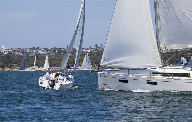 Mini Bateau on Port, the smallest boat in the fleet, sneaks ahead of Uwe Roehm's Currawong, who finished in second place in Division B photo copyright John Curnow taken at Cruising Yacht Club of Australia and featuring the Beneteau class