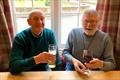 (L-R) Colin Brewer enjoys a drink with life-long friend, boatbuilder and designer John Mullins © Mullins family