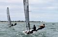 60th Cherub Australian National Championship - Zac Heyes & Peter McLeod (third overall, nearest camera) and Nicole Barnes & Brett Lancaster (second overall) © Keisha Day