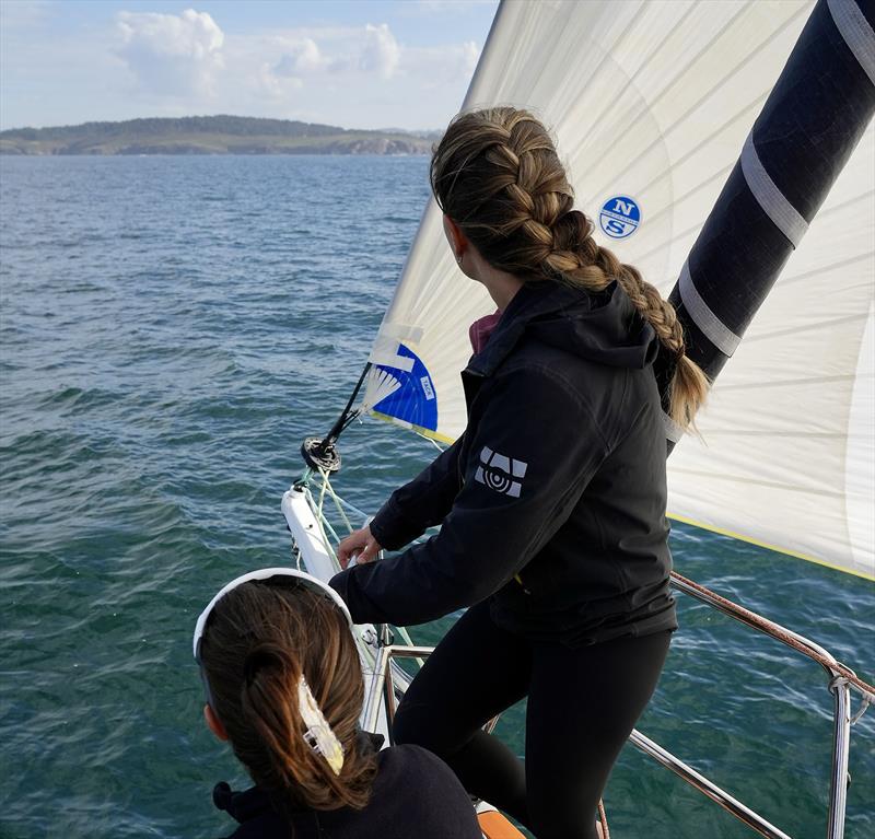 Cole Brauer (L) and Elizabeth Tucker (R) on the bow of First Light photo copyright Alvaro Sanchis taken at  and featuring the Class 40 class