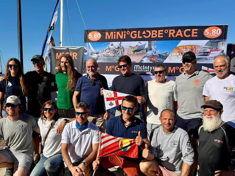 McIntyre Globe 580 Transat: Twelve passionate, crazy sailors in 'Mighty Minis' about to set sail with Don McIntyre, 580 Founder (back center left), and Rafael Lasso, Rubicon Marina manager (back center right) - photo © Aïda Valceanu