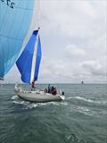 Close downwind sailing Drumbeat ahead of Jemma of Farley during the Round the Island Race 2025 © Gareth Penn