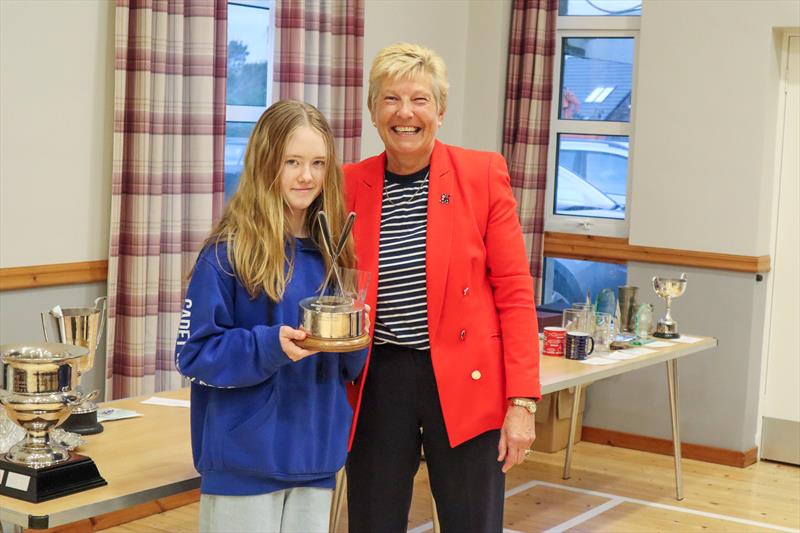Liz Train presenting Ida Iglehart with the Cadet Boat Handling Trophy photo copyright Nicola McColm taken at Solway Yacht Club and featuring the Dinghy class