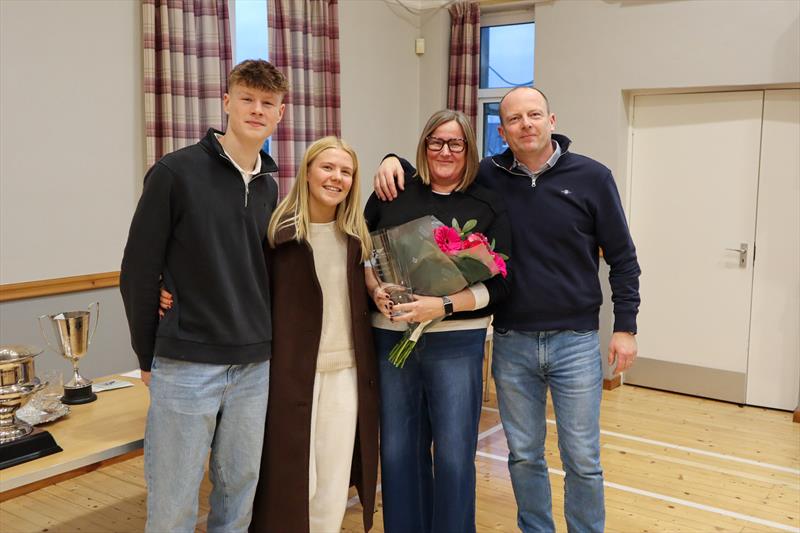 Solway YC's Cadet Officer (2028-2025) with her award, flanked by son Finn, daughter Katie and joined by husband Mark - photo © Nicola McColm