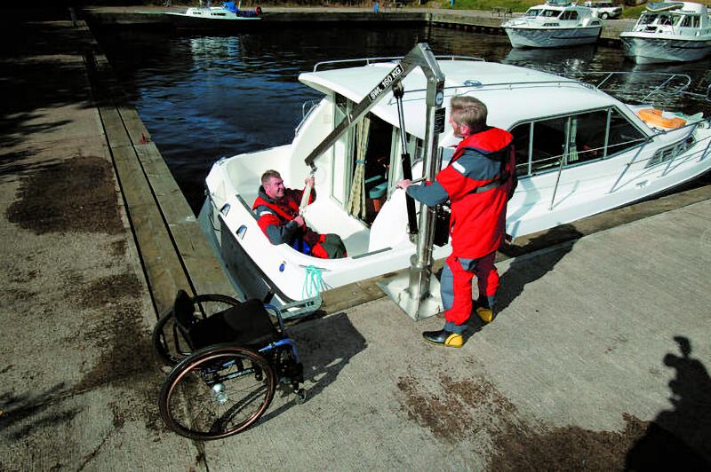 CrewLift is a heavy-duty hoist with a long reach, useful for sailors with a disbility - photo © Caley Marina