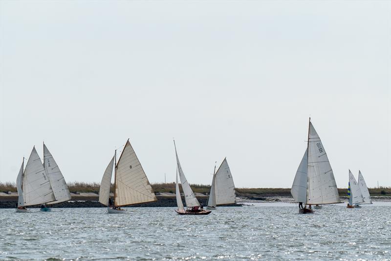 East Coast One Designs and Royal Corinthian One Designs sail during Burnham Week 2024 photo copyright Petru Balau Sports Photography / sports.hub47.com taken at Royal Corinthian Yacht Club, Burnham and featuring the East Coast One Design class