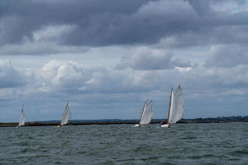 David Smith's East Coast One Design Wizard leads the fleet during Burnham Week 2025 photo copyright Petru Balau Sports Photography / sports.hub47.com taken at Royal Corinthian Yacht Club and featuring the East Coast One Design class
