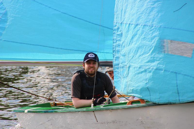 Portrait of Enterprise winning helm Ed Mayley, just visible behind the jib and crew James Budden (left) at the Minima Regatta 2023 - photo © Rehanna Neky