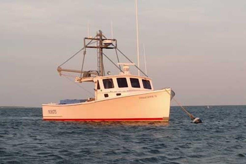 The Tenacious II, a commercial fishing boat that is used to conduct the Gulf of Maine bottom longline survey, tied up at a mooring. - photo © Captain Eric Hesse