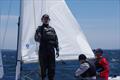 Ben Lamb is an imposing tactician on the foredeck of Magpie, supported by James Mayo, with Graeme Taylor on the helm on day 1 of the Etchells Australian Championship © Jeanette Severs