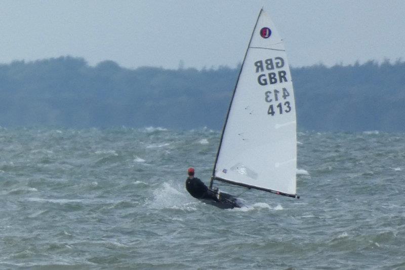 Alex Scoles sailing his Idol Composites boat in 25+ knots - Europe class Open and Youth Championships at Stokes Bay photo copyright Jennie Clark taken at Stokes Bay Sailing Club and featuring the Europe class