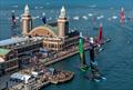 The New Zealand SailGP Team, Australia SailGP Team and Canada SailGP Team sail close to the spectators in the SailGP Race Stadium on Navy Pier  - SailGP USA Final - June  2023 © Simon Bruty / SailGP