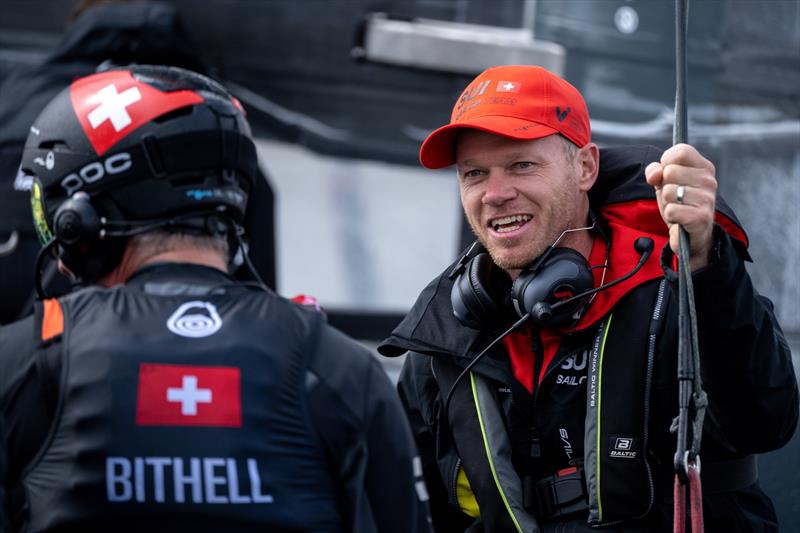 Nathan Outteridge,  Switzerland SailGP Team, speaks with Stuart Bithell, wing trimmer of Switzerland SailGP Team, during a break in racing on Race Day 1 of the Great Britain Sail Grand Prix | Plymouth in Plymouth, England photo copyright Jon Buckle/SailGP taken at Royal Plymouth Corinthian Yacht Club and featuring the F50 class