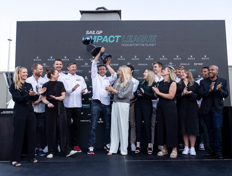 Emirates Great Britain SailGP Team staff members celebrate with the trophy after winning the SailGP Impact League, at the SailGP Impact Awards Ceremony ahead of the SailGP Season 4 Grand Final in San Francisco photo copyright Katelyn Mulcahy for SailGP taken at  and featuring the F50 class