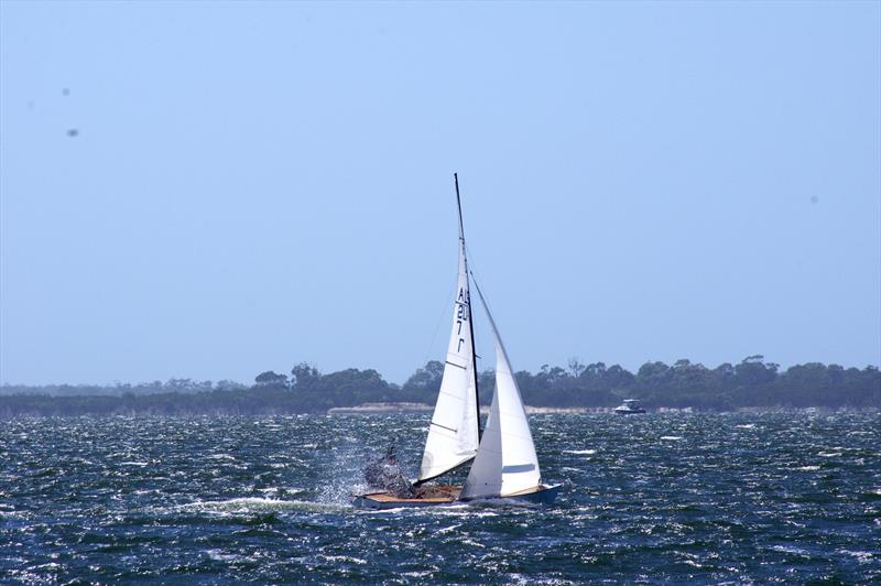 Rafe Heale and Tom Watson on board Power AUS7 are obscured by waves after rounding the leeward gate in race four of the Flying Dutchman 2026 Australian Championship - photo © Jeanette Severs