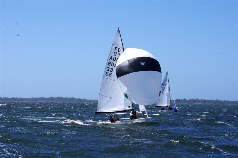 Peter Bevis moves up to shift the weight of the FD, causing Lupicus 60 AUS33 to surge ahead of Blu Tak AUS338 in race four of the Flying Dutchman 2026 Australian Championship - photo © Jeanette Severs