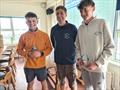 Jack McNaughten (left) with main organiser John Barry and crew Riaghan Boardman finish 3rd in the Silver fleet at the Irish Fireball Championship at Galway Bay © Frank Miller