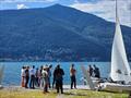 Sailors watching for wind from ashore on day 4 of the Fireball Europeans at Maccagno © Frank Miller