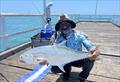 Here's Don with a sizeable Urangan Pier queenfish. Sight-fishing for cruising queenies can be fun this time of year