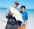 Tony and Gabriel with a lovely goldie they caught from the beautiful beach at Moon Point this week
