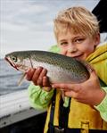 Ettie with a Great Lake Rainbow caught on the MOJO24