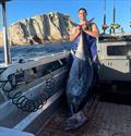 Joel Watling with a barrel from The Rock