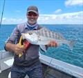 Tony was stoked to haul in this fine grunter. Many folks will enjoy catching these fish from our inshore waters post-flood