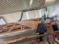 Hull #11 - Sal and Flipper fitting first foredeck plank