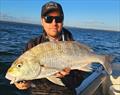 Carl with a sample of the sort of quality grunter you can find throughout the southern bay at present